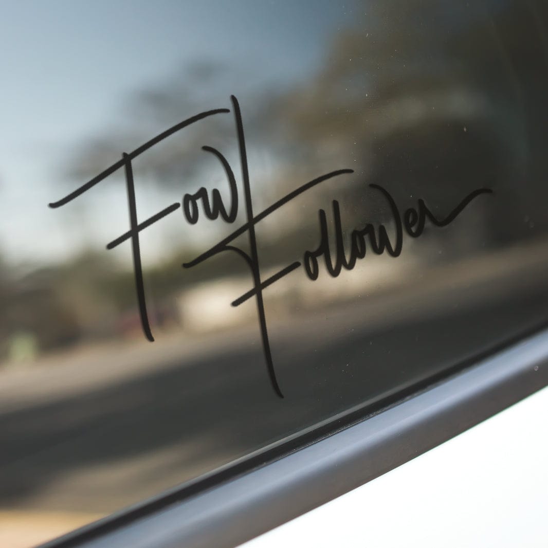 a close up of a car window with the word fail written on it.